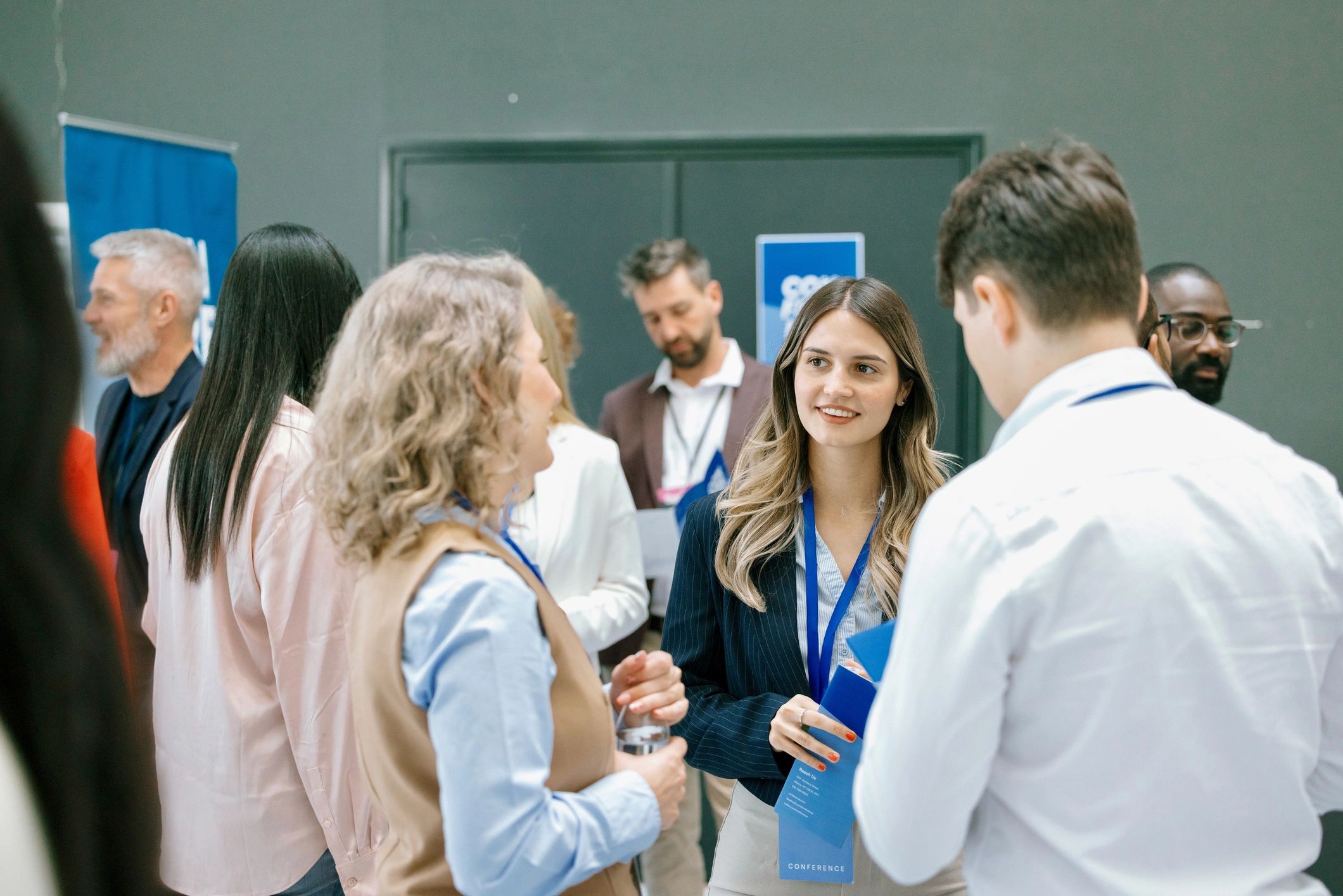 Alumni networking at a professional event