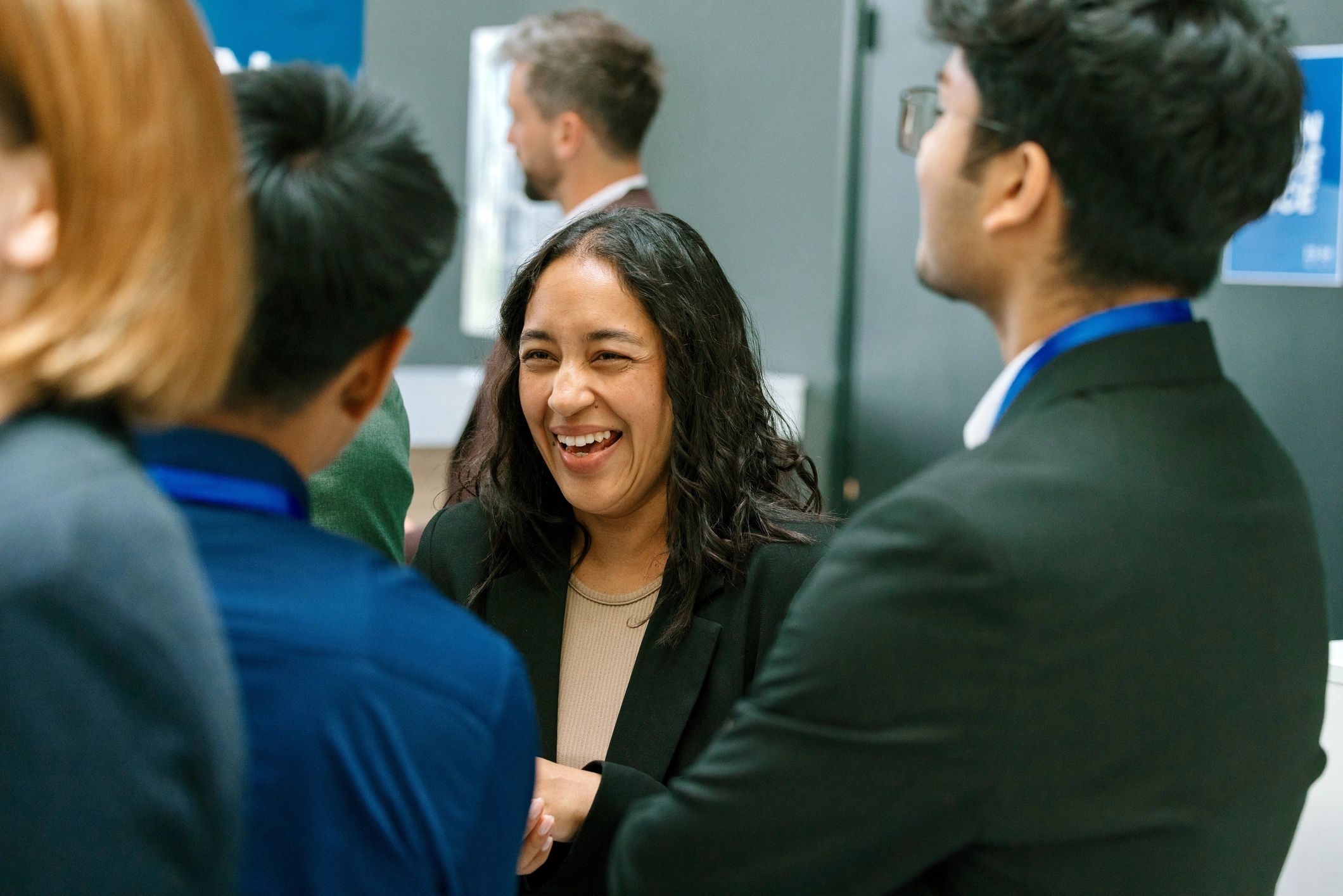 Alumni networking and conversation during a seminar