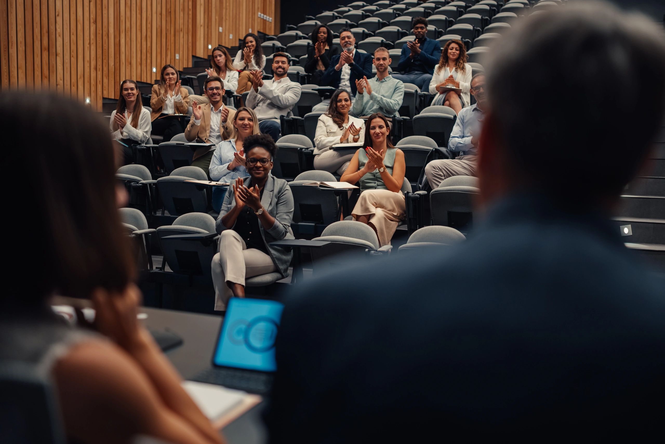 Group attending a conference in an auditorium